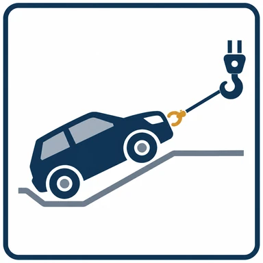Car being winched from a sloped ditch